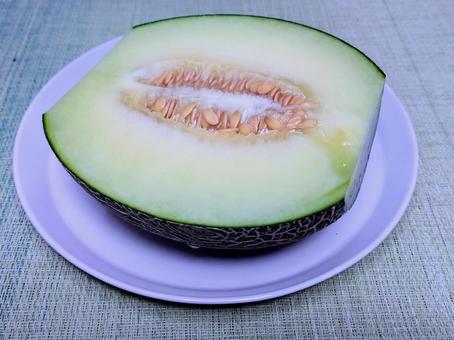 Melon cut in half, JPG Melon cut in half, JPG