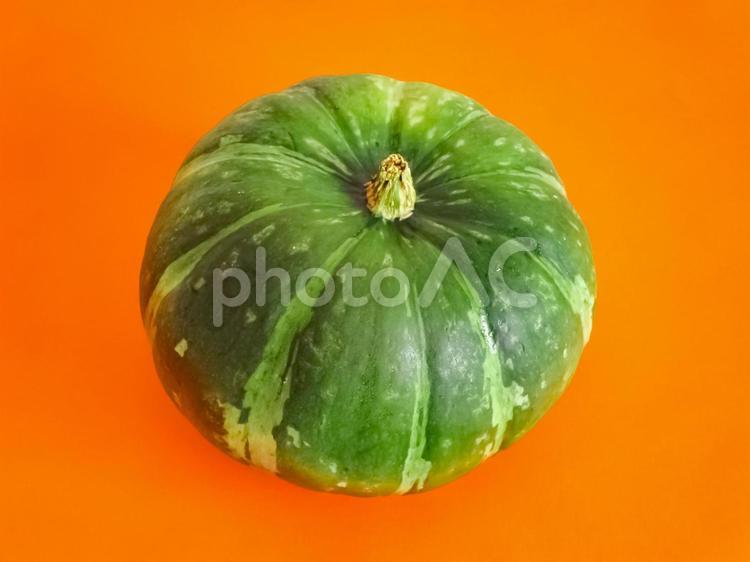 オレンジ背景のかぼちゃ かぼちゃ,カボチャ,パンプキンの写真素材