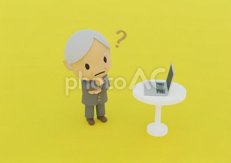 パソコンを前に疑問を感じるビジネスマン はてな,サポート,ヘルプの写真素材