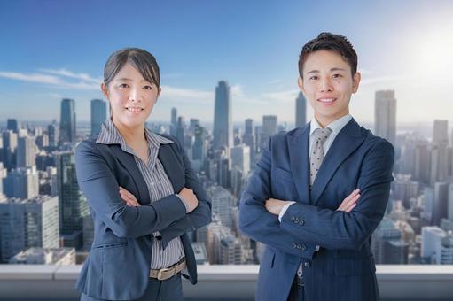 青空と働く人々 男女,スーツ,ビジネスマンの写真素材