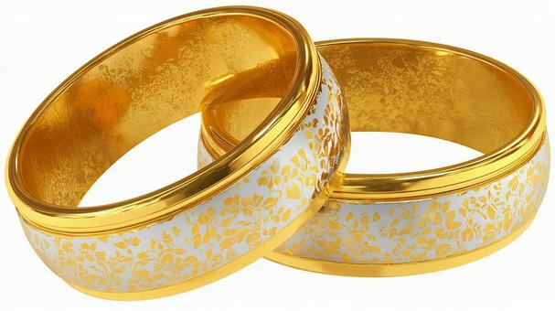 白い背景に輝くゴールドの結婚指輪 白い背景に輝くゴールドの結婚指輪の写真