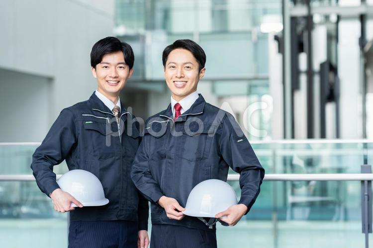 オフィスで働く作業員のスタッフ 作業員,ビジネス,作業服の写真素材