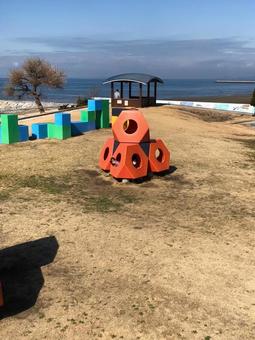 デザイナーズ公園と海の写真