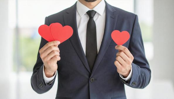 いいねをつける男性 いいねをつける男性の写真