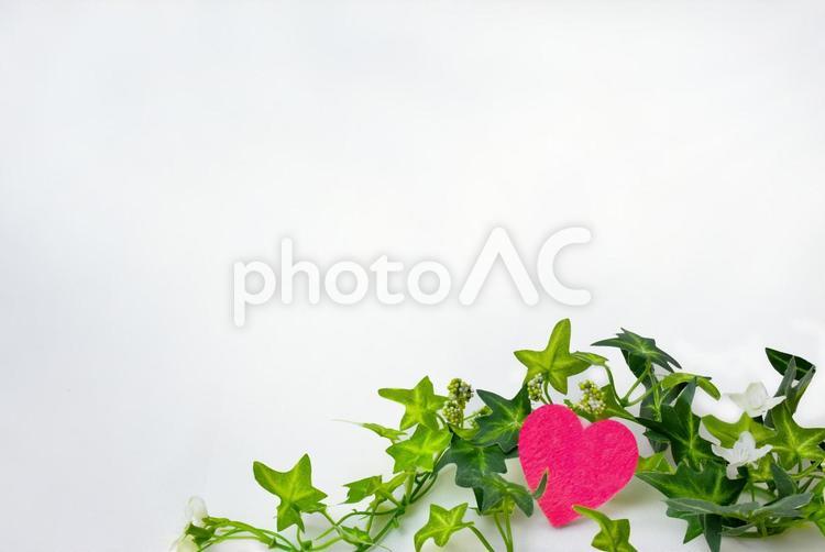 ハートとつた ハート,造花,背景の写真素材