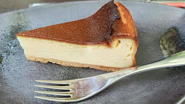 チーズケーキ チーズケーキ チーズケーキ,ケーキ,黒い皿の写真素材