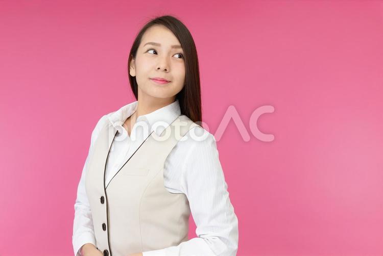 振り向くビジネスウーマン 女性,ビジネスウーマン,仕事の写真素材