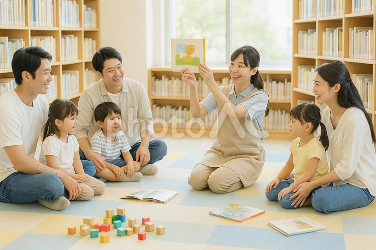 親子図書館おはなし会　読み聞かせ 読み聞かせ,図書館,親子の写真素材