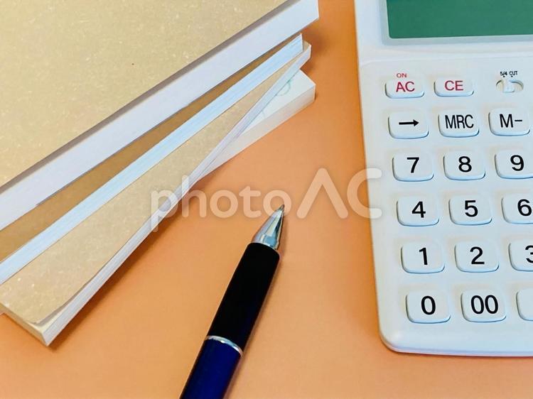 古本の買取査定 本,電卓,買取査定の写真素材