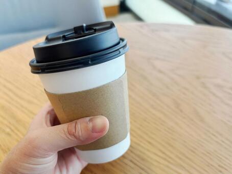 テイクアウトカップのコーヒー・スリーブ付 コーヒー,テイクアウト,スリーブの写真素材