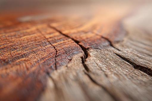 複雑な木目と割れ目のテクスチャの写真