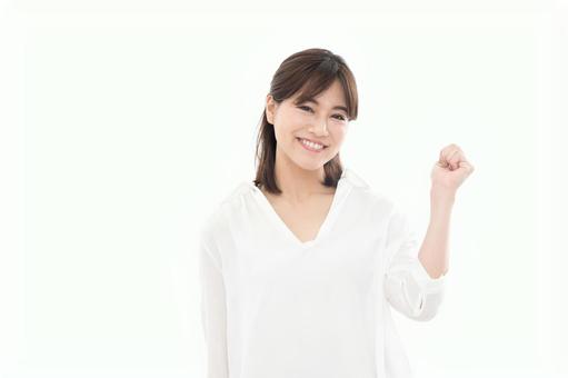 若い女性 ガッツポーズ 若い女性 ガッツポーズ 女性,人物,日本人の写真素材