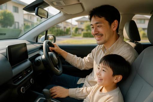 電気自動車の車内で笑顔の親子が過ごす様子 電気自動車の車内で笑顔の親子が過ごす様子の写真