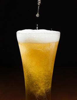 ビールの泡 ビールの泡 ビール,発泡酒,おいしそうなビールの写真素材