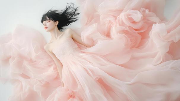 ピンクドレスの女性 ピンクドレスの女性の写真