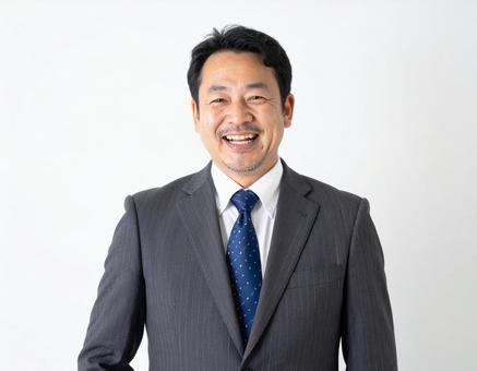 笑うビジネスマン 笑うビジネスマンの写真