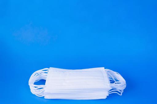 Simple mask on blue background, JPG Simple mask on blue background, JPG