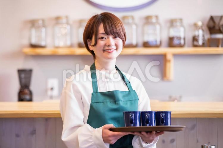 カフェのスタッフ カフェ,エプロン,スタッフの写真素材
