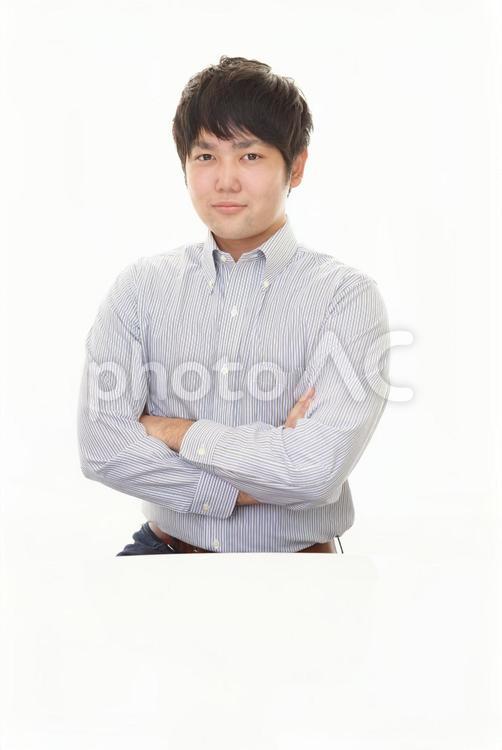 腕組みをする男性 男性,ビジネス,ビジネスマンの写真素材