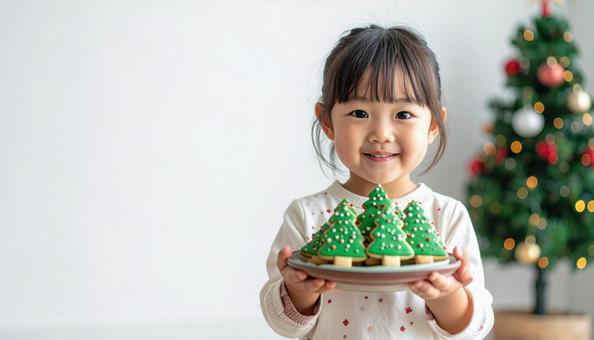 クリスマスクッキーと子供、コピースペース クリスマスクッキーと子供、コピースペースの写真