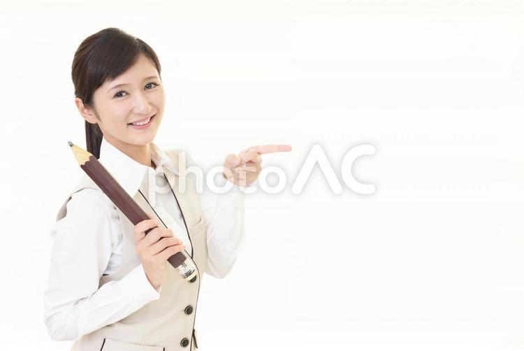 指示する笑顔のビジネスウーマン 女性,ビジネスウーマン,女の写真素材