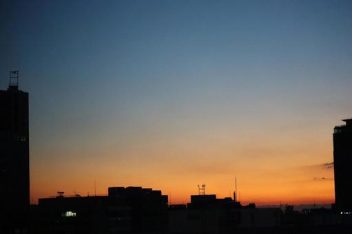 Silhouette cityscape and orange evening sky, JPG Silhouette cityscape and orange evening sky, JPG