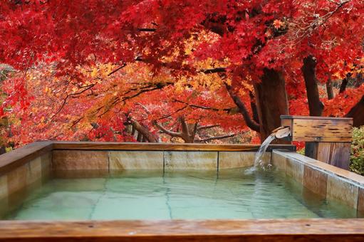 Open-air bath in the autumn leaves Open-air bath in the autumn leaves