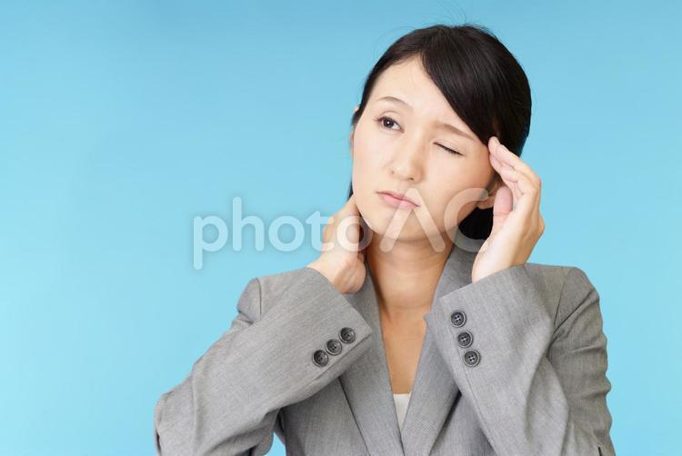 頭痛を訴える女性 女性,ビジネスウーマン,女の写真素材