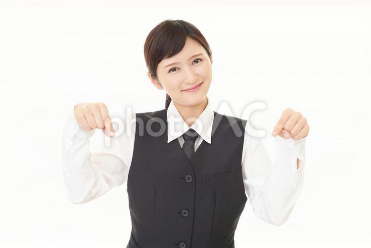指示する笑顔のビジネスウーマン 女性,ビジネスウーマン,女の写真素材