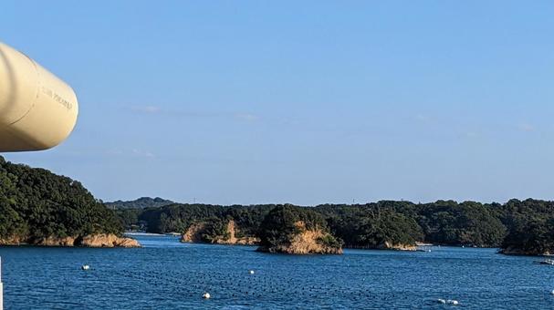島 舟,晴れ,島の写真素材