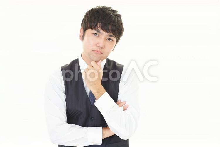 不安そうな表情のビジネスマン 男性,ビジネスマン,男の写真素材