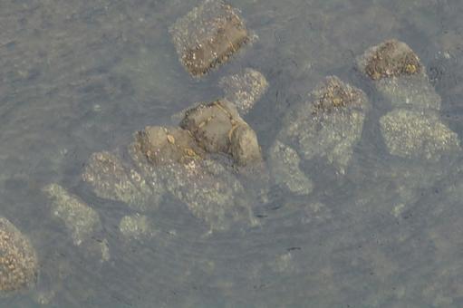 Rocks submerged in the sea, JPG