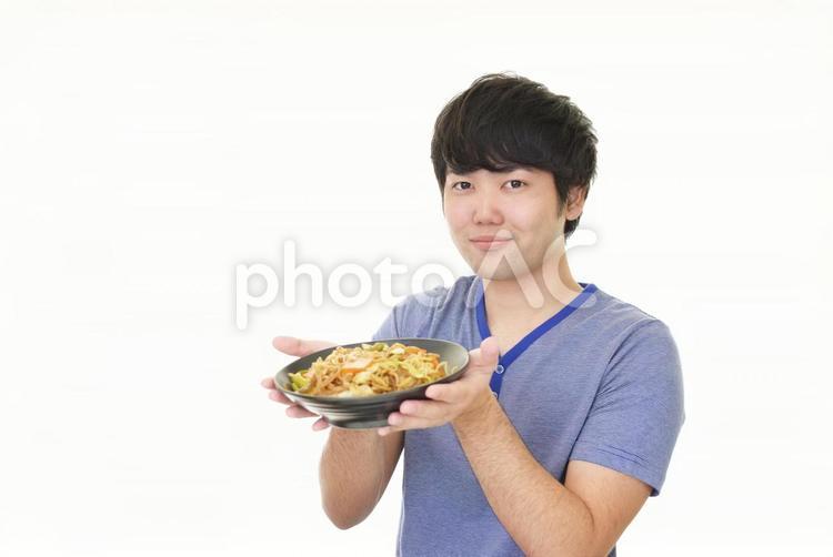 料理を楽しむ男性 男性,食欲,料理の写真素材