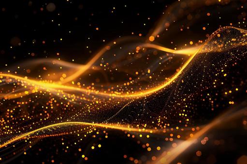 金色の光の粒子が舞う華やかな抽象背景の写真