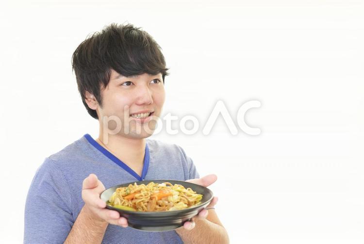 料理を楽しむ男性 男性,食欲,料理の写真素材