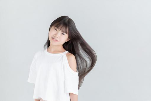 ロングヘアの健康的な女の子 ロングヘアの健康的な女の子の写真