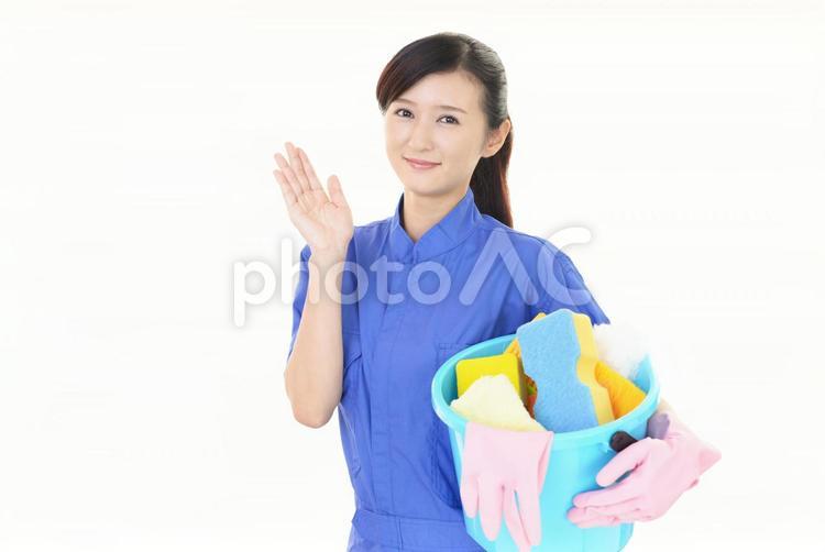 案内する笑顔の女性清掃員 女性,清掃員,作業員の写真素材