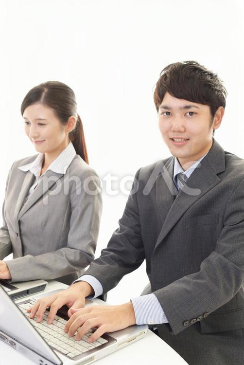 笑顔のビジネスマンとビジネスウーマン 男性,女性,ビジネスマンの写真素材