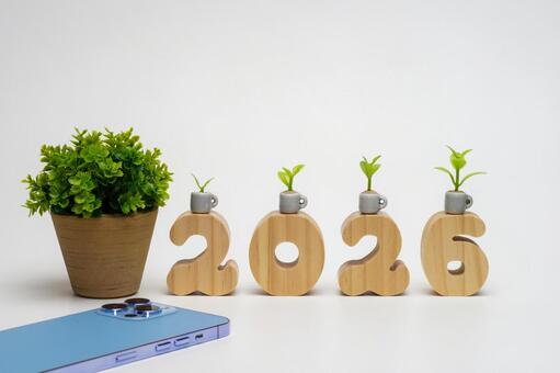 数字プレートで2026とスマートフォン 年賀状,白バック,手紙の写真素材