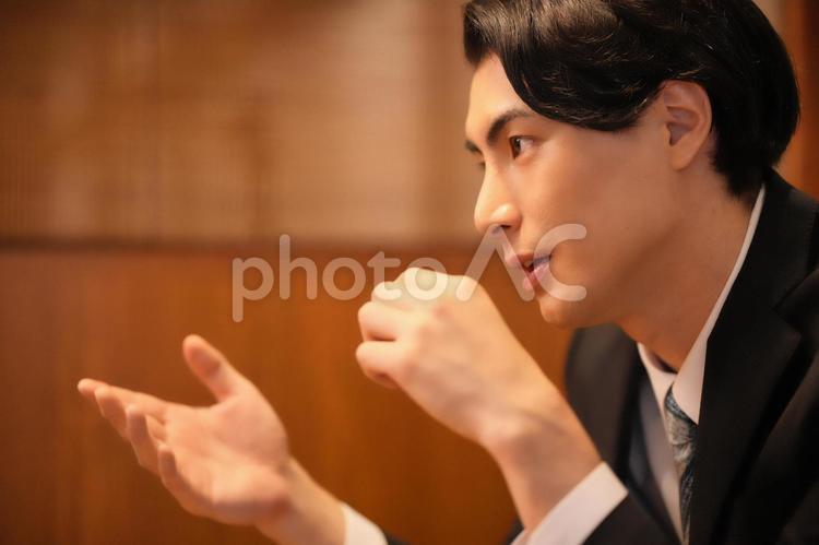 誰かと話している男性 男性,サラリーマン,客の写真素材