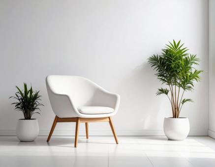 白いチェアと観葉植物の明るい室内の写真