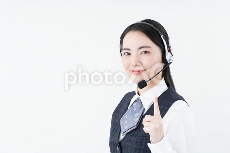おすすめするオペレーターの女性 おすすめ,オペレーター,ビジネスウーマンの写真素材