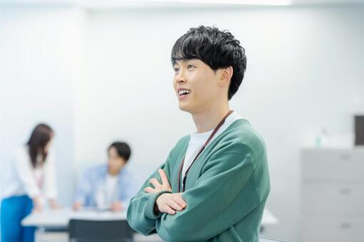 オフィスで働くビジネスパーソン ビジネスマン,笑顔,若いの写真素材