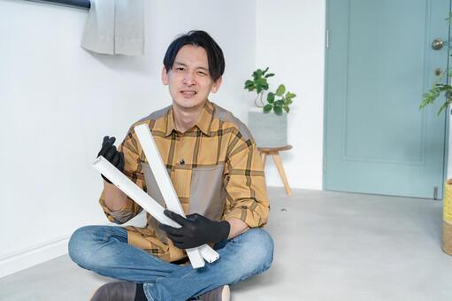 DIYを失敗して困る男性 職人,作業員,リフォームの写真素材