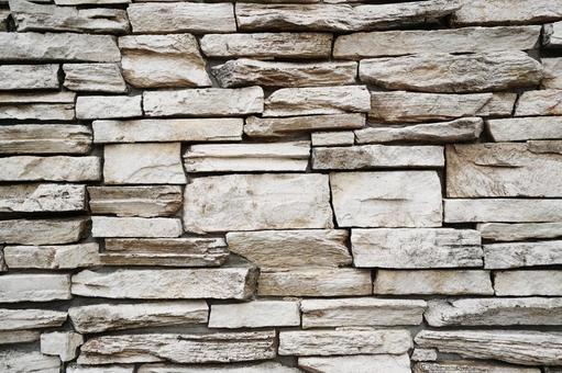 乱積みされた石壁のテクスチャ1 石壁,乱積み,壁材の写真素材