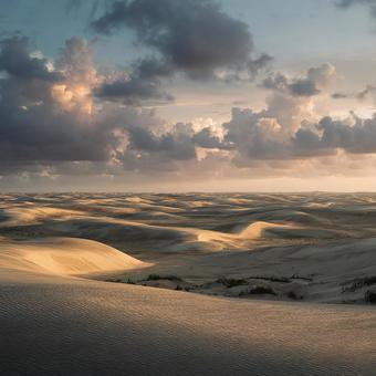 Sunset in the vast desert with beautiful wind patterns, desert, sand dunes, style, JPG