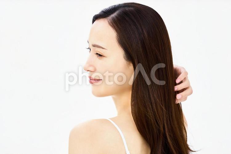 髪を触る女性　ヘアケア　美容 髪,ヘアケア,美容の写真素材