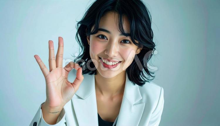 OKサインをする女性 サイン,マル,okの写真素材