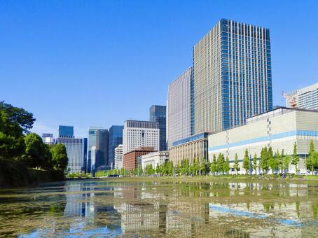 皇居日比谷濠と大丸有のビル街3 東京,丸の内二重橋ビル,東京會舘の写真素材