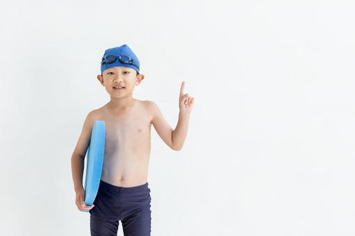 水着を着た笑顔の男の子 水着を着た笑顔の男の子 男の子,水着,白背景の写真素材